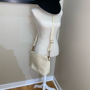 Creme cross body purse